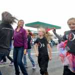 Photo by Rashah McChesney/Peninsula Clarion  Students from Vergine's Dance Studio jump around for the crowd during the annual Fourth of July parade in 2013 in Kenai, Alaska.