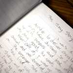 Photo by Rashah McChesney/Peninsula Clarion Nicole Harmon is handwriting a book about her life as she reflects on the traumatic events - first a 2003 car accident, then a 2011 stroke - that resulted in her partial paralyzation and traumatic brain injury.