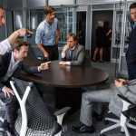This photo provided by Paramount Pictures shows Jeremy Strong, from left, as Vinny Peters, Rafe Spall as Danny Moses, Hamish Linklater as Porter Collins, Steve Carell as Mark Baum, Jeffry Griffin as Chris and Ryan Gosling as Jared Vennett, in the film, "The Big Short," from Paramount Pictures and Regency Enterprises. (Jaap Buitendijk/Paramount Pictures via AP)