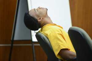 Photo by Rashah McChesney/Peninsula Clarion In this Nov. 13, 2015 file photo, convicted murderer Demarqus Green reacts after Kenai Superior Court Judge Anna Moran decided to reschedule a sentencing hearing in Kenai, Alaska. Green has been sentenced to 40 years in jail for a 2012 shooting.