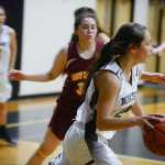 Photo by Rashah McChesney/Peninsula Clarion Nikiski's Rylee Jackson manuevers around a Mt. Edgecumbe player during their game on Saturday Jan. 9, 2016 in Nikiski, Alaska. Nikiski lost the game 63-24.