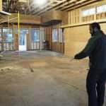 Photo by Elizabeth Earl/Peninsula Clarion Kenai River Brewing Company co-owner Doug Hogue stands in the future pub space of the company's new building on Forty-Seventh Street in Soldotna. The pub will have space for about 85 people at any one time, plus an outdoor patio, Hogue said.