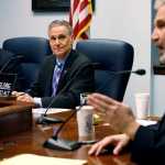 State Sen. John Coghill, left, R-North Pole, and Senate President Kevin Meyer, middle, listen as state Sen. Pete Kelly, R-Fairbanks, speaks during a news conference, Tuesday, Jan. 19, 2016, in Juneau, Alaska, prior to the start of the 2016 legislative session. Republican leaders said they would focus on budget cuts and cost-saving measures to major programs as the state faces a $3.5 billion budget deficit. (AP Photo/Rashah McChesney)