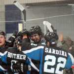 Photo by Jeff Helminiak/Peninsula Clarion Austin Junger, Evan Butcher, Croix Evingson and Joey Sardina celebrate the Kenai River Brown Bears' 3-2  victory over the Springfield Jr. Blues on Friday, Jan. 22, 2016, at the Soldotna Regional Sports Complex.