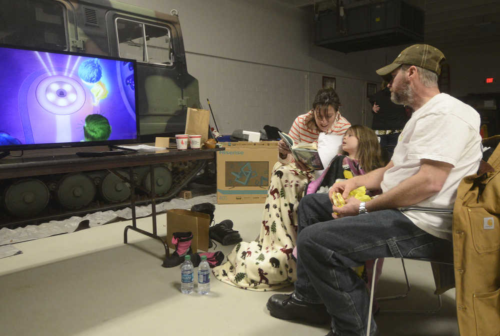 Photo by Megan Pacer/Peninsula Clarion Kenai Police block off the entrance to Lilac Lane from the Kenai Spur Highway on Sunday, Jan. 24, 2016, in Kenai, Alaska. A 7.1 magnitude earthquake was felt on the peninsula and caused gas explosions in homes along Lilac Lane.