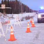 Photo by Megan Pacer/Peninsula Clarion Enstar Natural Gas personnel work at the intersection of Lilac Lane and the Kenai Spur Highway after shutting off the area's gas supply on Sunday, Jan. 24, 2016 in Kenai, Alaska. A 7.1 magnitude earthquake caused gas explosions in four houses along Lilac Lane.