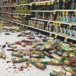 Photo by Megan Pacer/Peninsula Clarion Robin and Shannon Muster relax with their daughter, six-year-old Effie, in a temporary shelter after being evacuated from their home on Lilac Lane on Sunday, Jan. 24, 2016 at the Kenai National Guard Armory in Kenai, Alaska. A 7.1 magnitude earthquake caused gas explosions on Lilac Lane.