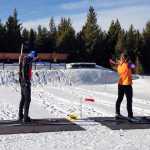 In this photo taken Nov. 23, 2015, biathlon racers practice on the firing range at the West Yellowstone Rendezvous Ski Trails center, in West Yellowstone, Mont. Cross country skiing is a full-body activity that places demands on arms, shoulders, legs, core and lungs, and racers must also master the art of picking the perfect ski wax to match snow conditions. Biathlon requires all of those skills, but adds an 8-pound rifle that's strapped to the skier's back and the discipline to calm everything down in an instant to fire off five shots in between skiing laps. (AP Photo/Martha Bellisle)