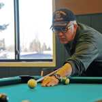 Photo by Elizabeth Earl/Peninsula Clarion Ken Losser of Soldotna, Alaska takes stock of the pool table during a match in the Senior Olympics at the Kenai Recreation Center on Tuesday, Feb. 16, 2016.