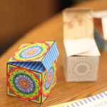 Photo by Kelly Sullivan/ Peninsula Clarion Amy Murrell found free coloring pieces by Anchorage artist Shala Kerrigan for the public to use at the Adult Coloring event Feb. 13, 2016, in Kenai, Alaska.