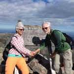 Mary and Tom Rhyner complete their trek of the Appalachian Trail on Mount Katahdin in Maine on Sept. 28, 2015. (Photo courtesy Tom and Mary Rhyner)