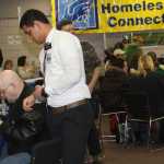 Volunteers welcome those with needs