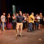 Justin Ruffridge, center, practices performing the song "Ya Got Trouble" as title character Harold Hill from "The Music Man" during a rehearsal on Tuesday, Feb. 16, 2016 at Kenai Central High School in Kenai, Alaska.