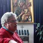 In the nave of Kenai's Holy Assumption of the Virgin Mary Russian Orthodox Church, a Byzantine-style icon of Mary sits on a podium in the foreground, while behind it a Western-style painting of Mary stands on the iconostasis, on Friday, Feb. 26 in Kenai.