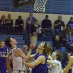 Photo by Joey Klecka/Peninsula Clarion (From left to right) Soldotna forward Derek Evans, Palmer forward Michael Kluting and Soldotna guard Eli Sheridan jostle for the ball Friday at Soldotna High School.