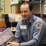 Photo by Elizabeth Earl/Peninsula Clarion Mick Wykis reads to a class at Mountain View Elementary School in Kenai during the annual community reading event on Friday, Feb. 26, 2016,