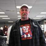 Photo by Elizabeth Earl/Peninsula Clarion Dan Ames shows off his support for Donald Trump as he prepares to vote at the Republican Presidential Preference Poll at the Soldotna Sports Complex on Tuesday, March 1, 2016.