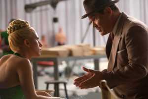In this image released by Universal Pictures, Scarlett Johansson, left, and Josh Brolin appear in a scene from "Hail, Caesar!." (Alison Rosa/Universal Pictures via AP)