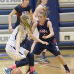 Photo by Jeff Helminiak/Peninsula Clarion Soldotna's Daisy Nelson dribbles against Kenai Central's Cori Holmes on Saturday at Soldotna High School.