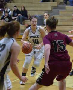 Photo by Joey Klecka/Peninsula Clarion Nikiski forward Hallie Riddall looks for an opening against Grace Christian in a Southcentral Conference game Feb. 18 at Nikiski High School.