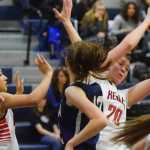 Photo by Joey Klecka/Peninsula Clarion Kenai Central forward Lara Creighton (20) grabs a rebound against Soldotna Thursday at the Northern Lights Conference tournament at Palmer High School.
