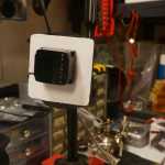 John Parker, founder of Integrated Robotics Imaging Systems, keeps his company's new radar mounted to a white background on Thursday, Feb. 25, 2016 at the business on Main Street Loop in Kenai, Alaska. The new radar can be mounted to an unmanned aerial vehicle and can detect up to six objects at a time.