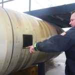 The inside of a prop airplane used to train first responders for aircraft fires or emergencies includes a cockpit, shown in this Monday, March 21, 2016 photo at the Beacon Occupational Health and Safety Services Training Center in Kenai, Alaska. Here, trainees can practice shutting off power and other steps in fighting and aircraft fire.