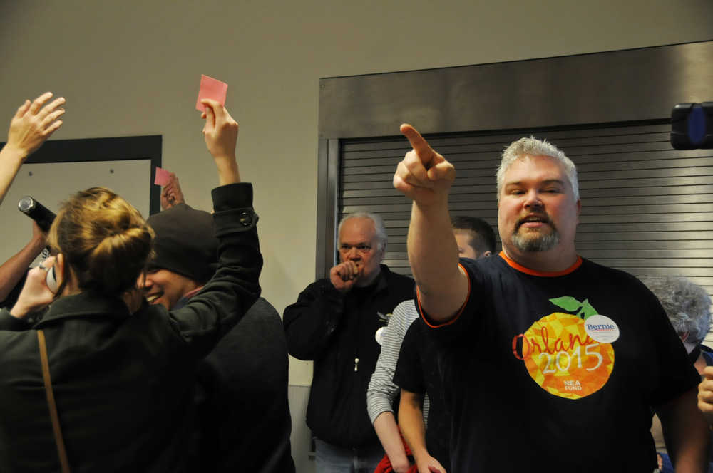 Photo by Elizabeth Earl/Peninsula Clarion Dave Brighton helped to coordinate the election of the delegates for Bernie Sanders at the Democratic caucus Saturday at Kenai's Challenger Learning Center. The delegates will represent Sanders at the statewide Democratic conference in Anchorage in May.