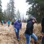 Photo by Megan Pacer/Peninsula Clarion Kenaitze Indian Tribe members, students and Kenai Peninsula College faculty get ready for an opening prayer led by Dena'ina Elder Max Chickalusion Jr. on Thursday, March 24, 2016 at Kalifornsky Village off of Kalifornsky Beach Road in Alaska.