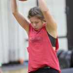 Photo by Jeff Helminiak/Peninsula Clarion Kenai Central junior Julianne Wilson does the ball slam en route to winning the Fight Gone Bad at the Speed and Strength Training competition Wednesday at Nikiski High School.
