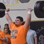 Photo by Jeff Helminiak/Peninsula Clarion Nikiski senior Ruben Sepeda competes in the snatch at the Speed and Strength Training competition Wednesday at Nikiski High School.