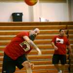 Travis Burnett of the Magnum Motors dodgeball team flings a ball at an opponent, with teammate James Dye in the background, during the Young Professionals Dodgeball tournament on Saturday, March 26 at the Kenai Central High School gymnasium.