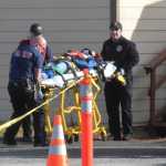 Photo by Megan Pacer/Peninsula Clarion  Members of Central Emergancy Services carry a volunteer playing an injured victim out of a building on a stretcher as part of an Alaska Shield exercise on Thursday, March 31, 2016 at the Kenai Peninsula Borough building in Soldotna, Alaska.