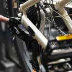 Photo by Elizabeth Earl/Peninsula Clarion Using different kinds of lubrication for different parts of a bike can help prevent buildup of grease or parts becoming stiff. Brad Carver of Beemun's Bike and Ski Loft recommended using a lighter lube for the pivot oints and a medium lube for the chain.