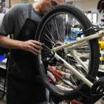 Photo by Elizabeth Earl/Peninsula Clarion Untrue wheels can be another consequence of winter riding, courtesy of ruts and normal wear and tear. Bike mechanics at Beemun's Bike and Ski Loft can true a fairly damaged wheel but will let the owner know if a wheel is beyond saving, said Brad Carver, a mechanic.