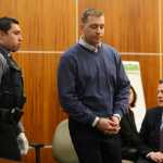 Photo by Megan Pacer/Peninsula Clarion Paul Vermillion, 32, is led out of the courtroom to be remanded to jail during a hearing on Thursday, April 7, 2016 at the Kenai Courthouse in Kenai, Alaska. During a hearing on Monday, April 4, Vermillion pleaded guilty to one count of manslaughter for the 2013 death of Genghis Muskox in Cooper Landing.