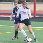 Photo by Joey Klecka/Peninsula Clarion Kenai Central junior Lara Creighton controls the ball Wednesday in the Kardinals season opener against Homer. Kenai defeated the Mariners 3-0.