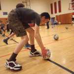 Photo by Kelly Sullivan/ Peninsula Clarion Connections students race to stake their claim on the limited supply of dodgeballs Tuesday, March 29, 2016, at the Kenai Recreation Center in Kenai, Alaska.