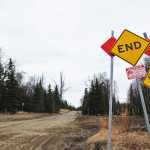 Photo by Elizabeth Earl/Peninsula Clarion The road to Gray Cliff and Moose Point extends past the pavement in Captain Cook State Park, shown on Monday, April 11, 2016. Apache Corporation, which was exploring for oil and gas in the area, had announced plans to extend the road to Gray Cliff before the company's withdrawal from Alaska in March 2016. The company is engaged in talks with the Kenai Peninsula Borough to potentially donate its preliminary environmental and engineering work to the borough so it could pick up the project.