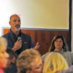Photo by Elizabeth Earl/Peninsula Clarion Matt Horneman, the deputy lands manager for the Alaska LNG Project, updates a group of Nikiski residents during a community meeting at the Kenai Visitors and Cultural Center on Thursday, April 16, 2016. In response to a question about land purchases, Horneman said the project managers have already contacted everyone whose lands they intend to buy for the project for now.
