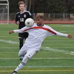 Photo by Joey Klecka/Peninsula Clarion Kenai Central sophomore Kevin Ramos winds up for a kick Tuesday evening against Nikiski at Ed Hollier Field in Kenai.