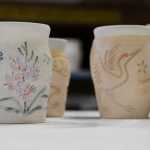 Photo by Elizabeth Earl/Peninsula Clarion Mugs made by Laura Faeo, the president of the Kenai Potter's Guild, wait patiently to be fired at the Kenai Fine Arts Building on Friday, April 15, 2016. The mugs take 12 hours of firing and several days of cooling before they are finished and sold.