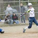 Photo by Jeff Helminiak/Peninsula Clarion Soldotna left fielder Jazi Larrow doubles home two runners to give the Stars an 11-0 lead over Kodiak in the bottom of the second inning Friday at the Soldotna Little League fields.