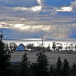 Photo by Elizabeth Earl/Peninsula Clarion Frank and Mary Ferguson can see three volcanoes on the west side of Cook Inlet from their back porch near Clam Gulch, Alaska, seen on Friday, April 29, 2016.