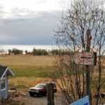 Photo by Elizabeth Earl/Peninsula Clarion A sign on Corea Bend Road near Clam Gulch, Alaska, warns drivers to watch out for a neighbor's deaf dog on Friday, April 29, 2016. Neighbors are concerned about additional traffic on their road if a proposed gravel pit is built on an adjoining property.