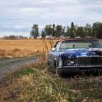Photo by Elizabeth Earl/Peninsula Clarion A narrow gravel road leads across a hayfield and down into an old gravel pit near the bluff just south of Clam Gulch, Alaska on Friday, April 29, 2016. A proposed gravel pit would use the road, approximately 9 feet wide, to move equipment in and material out. The road winds up across the hay field and through a subdivision on the side of the bluff.