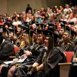 Photo by Megan Pacer/Peninsula Clarion Graduates await the end of their graduation ceremony Thursday, May 5, 2016 in the Renee C. Henderson Auditorium at Kenai Central High School in Kenai, Alaska.