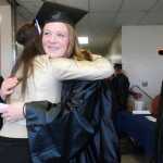 Photo by Megan Pacer/Peninsula Clarion Soldotna residents Cassandra Boze, left, and Becca Satathite share a laugh just before their graduation ceremony on Thursday, May 5, 2016 in the Renee C. Henderson Auditorium at Kenai Central High School in Kenai, Alaska. Boze graduated with a Associate Degree of Appied Science in Nursing, and Satathite with an Associate Degree of Applied Science in Paramedic Technology.