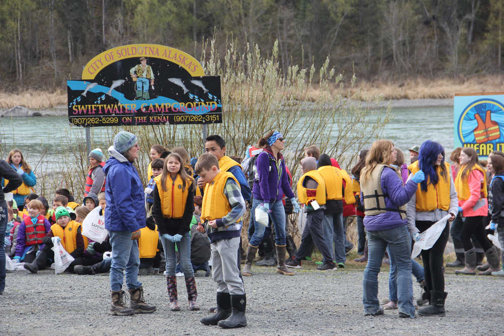 Redoubt students arrive at Swift River campground for spring cleanup.