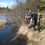 Photo by John Messick/For the Clarion Researcher Ben Meyer takes a temperature reading on Upper Russian Creek, near Cooper Landing the weekend of May 6-8, 2016.